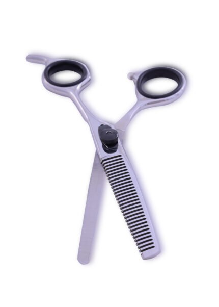 Close-up of hair thinning shear with Japanese steel construction and razor-edge teeth.
