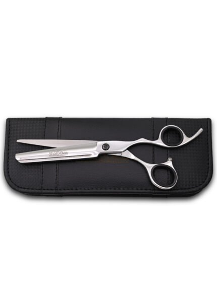 Open face view of silver shears with comb