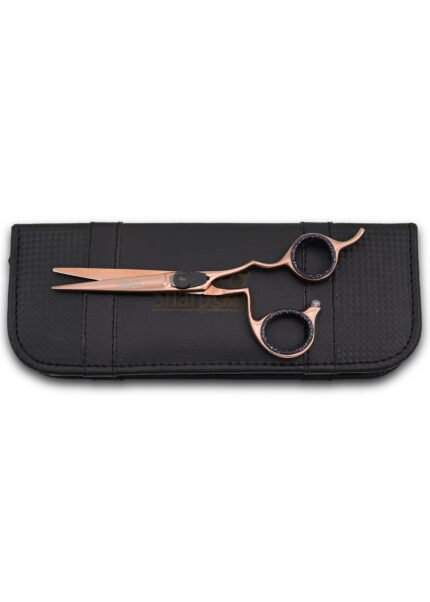 Close-up of the tension adjustable screw on the right side of Rose Gold Hair Cutting Shears