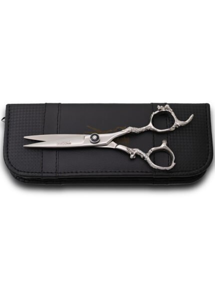 Close-up of the tension adjustment screw on the right side of Silver Hair Cutting Shears.