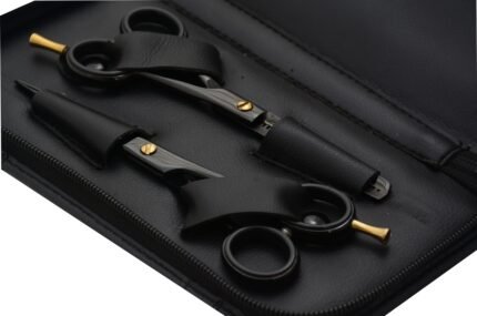Close-Up of Ceramic Black Barber Shears SetA detailed close-up view of the precision hair cutting shears and thinning shears in our Ceramic Black Barber Shears Set.